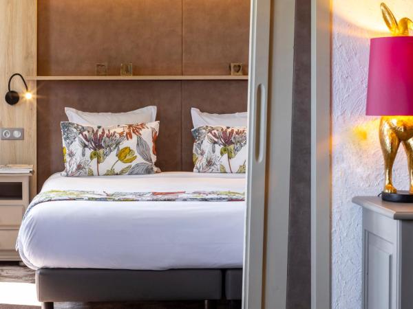 Hôtel Courcheneige : photo 6 de la chambre suite