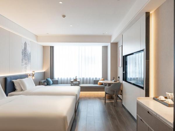 Mehood Hotel Xi'an High-tech Software New City International Conference Center : photo 1 de la chambre chambre affaires lits jumeaux