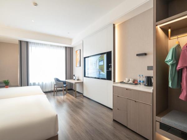 Mehood Hotel Xi'an High-tech Software New City International Conference Center : photo 4 de la chambre chambre affaires lits jumeaux