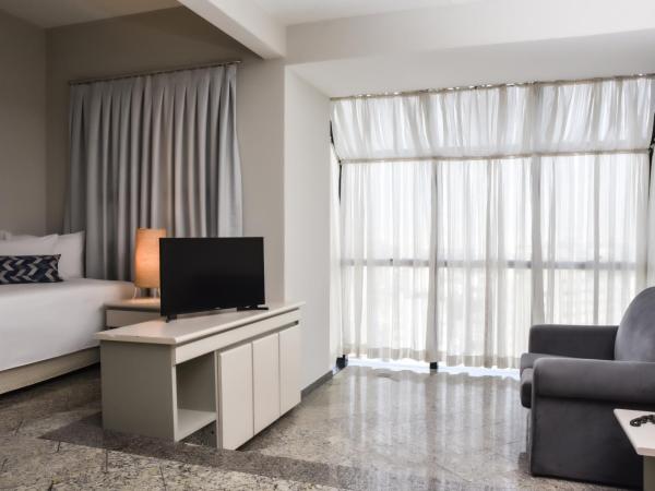 Plaza Inn Small Town Flat : photo 1 de la chambre chambre double deluxe