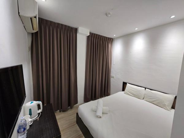 One Point Hotel @ King Centre : photo 2 de la chambre chambre lit queen-size deluxe