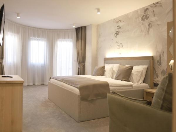 Bracera Inn : photo 1 de la chambre suite lit king-size avec balcon