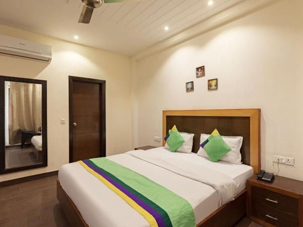 Treebo White Castle, Gurgaon : photo 6 de la chambre chambre double deluxe