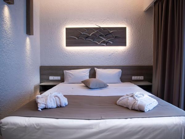 Porto Greco Village Beach Hotel : photo 3 de la chambre chambre familiale de luxe deux chambres 