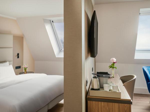 NH Berlin Kurfürstendamm : photo 1 de la chambre suite junior