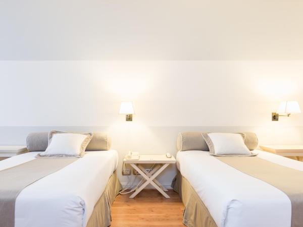 Loi Suites Recoleta Hotel : photo 6 de la chambre chambre lits jumeaux supérieure