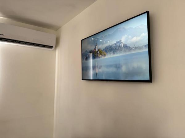 JESAVI Suites : photo 2 de la chambre chambre deluxe avec 2 lits doubles