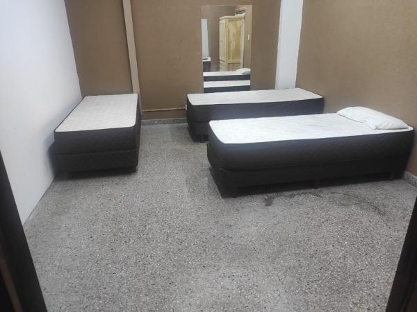 Hostel Harmony : photo 1 de la chambre chambre triple basique avec salle de bains commune