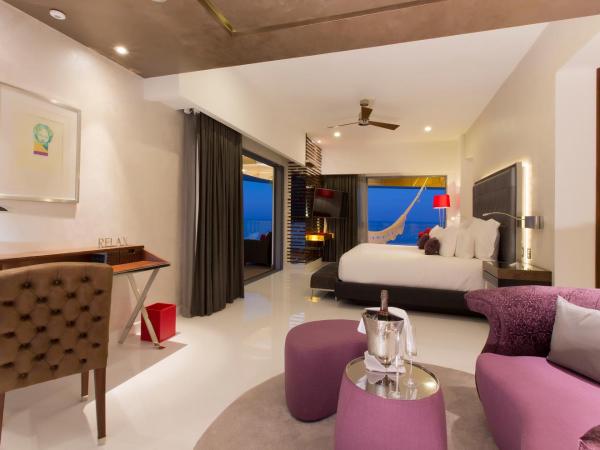 Garza Blanca Preserve Resort & Spa : photo 7 de la chambre hébergement réservé aux adultes - surclassement gratuit en suite mousai