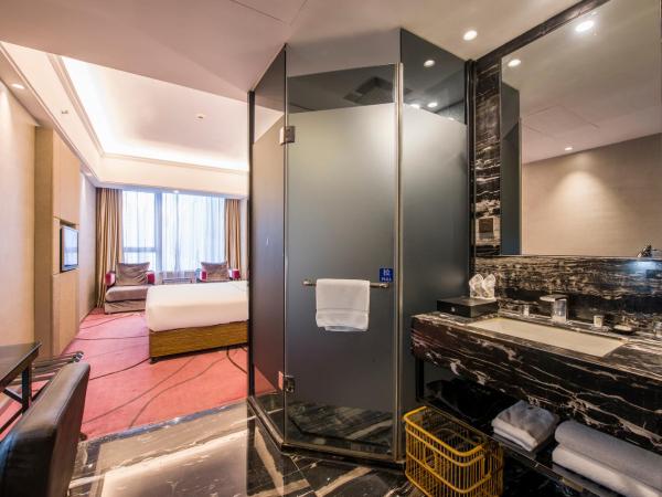La Perle International Hotel - Free shuttle between hotel and Exhibition Center during Canton Fair & Exhibitor registration Counter : photo 4 de la chambre comfort king room