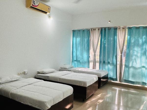 Elite stays viman nagar : photo 3 de la chambre chambre triple - vue sur ville