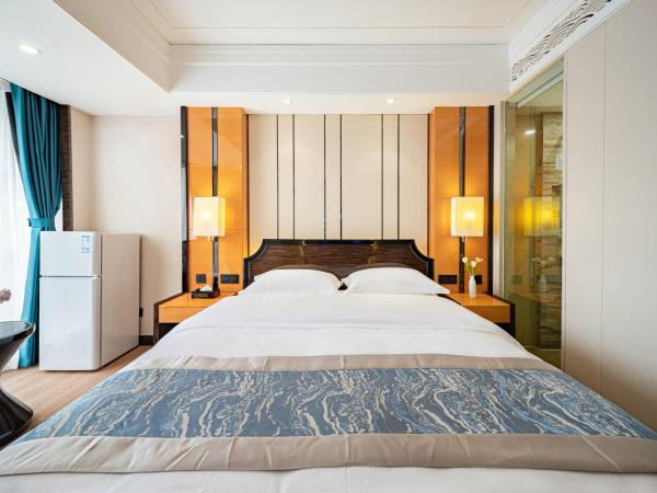 Evening Breeze Hotel 晚风酒店 : photo 2 de la chambre city view standard king room