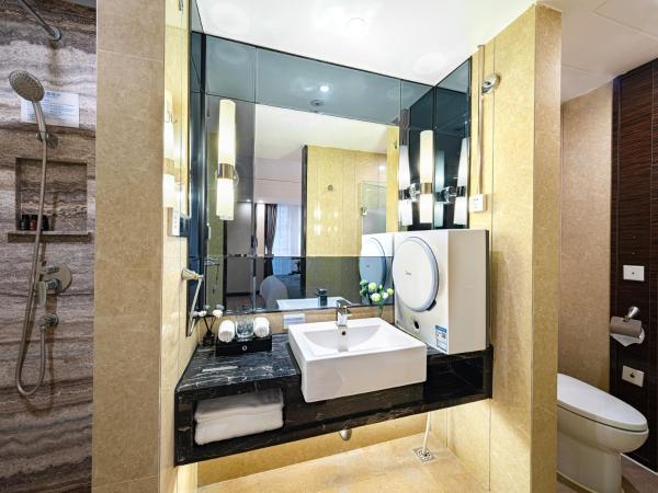 Evening Breeze Hotel 晚风酒店 : photo 6 de la chambre chambre king-size de luxe - vue sur la ville