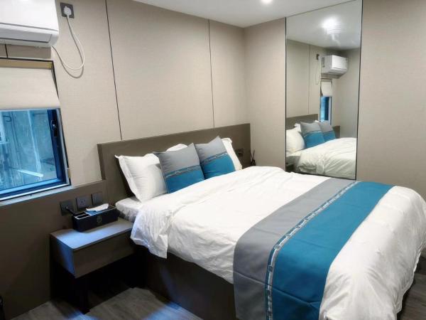 杏花小筑商务大床房 : photo 6 de la chambre studio avec lit queen-size