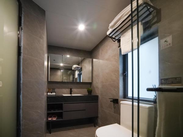 杏花小筑商务大床房 : photo 2 de la chambre studio avec lit queen-size