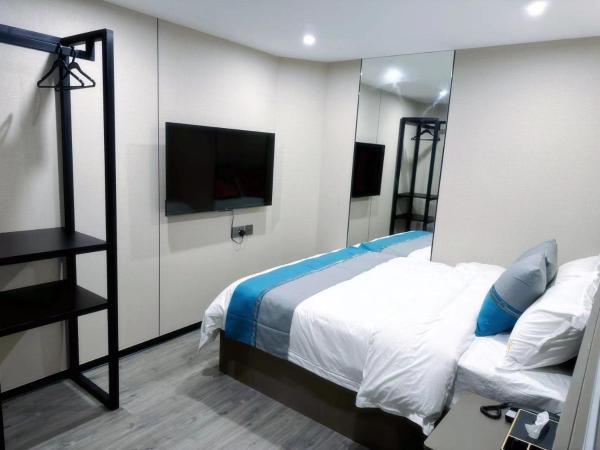 杏花小筑豪华大床房 : photo 2 de la chambre appartement supérieur 1 chambre