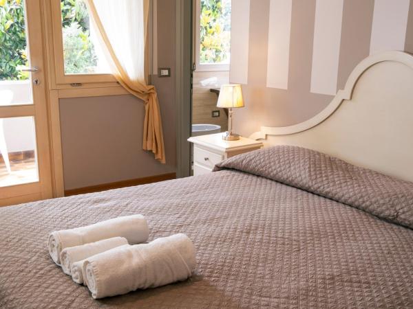 Hotel Volta : photo 2 de la chambre chambre double ou lits jumeaux - vue sur jardin