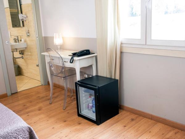 Hotel Volta : photo 8 de la chambre chambre double ou lits jumeaux - vue sur jardin