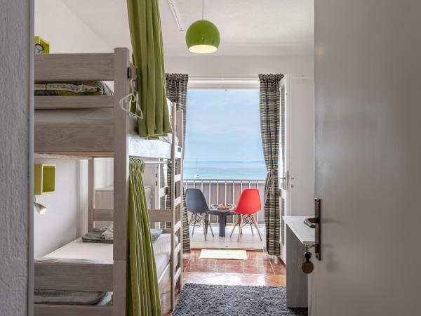 Hostel Casa La Cha : photo 8 de la chambre chambre lits jumeaux - vue sur mer