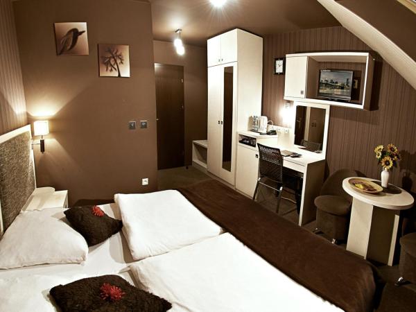 Apart A2 Bezobsługowy 24h Poznań : photo 2 de la chambre chambre triple avec salle de bains privative