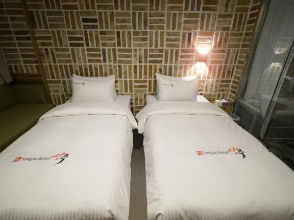 Sangju Hotel Seoul : photo 3 de la chambre chambre lits jumeaux deluxe