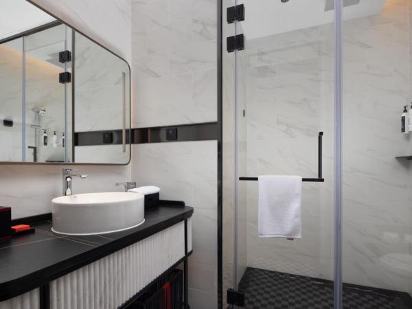 Radisson Red Guangzhou South Railway Station-Canton Fair free shuttle bus & designated license points & Free VPN network : photo 4 de la chambre chambre lits jumeaux deluxe