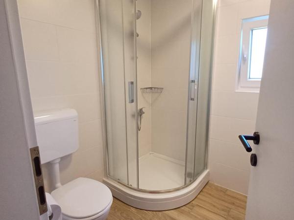 Apartments & Rooms Darrer : photo 1 de la chambre appartement - vue sur jardin