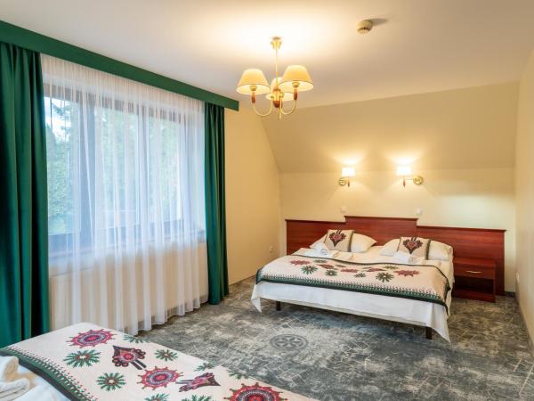 Willa Monte Rosa : photo 1 de la chambre hébergement quadruple de luxe