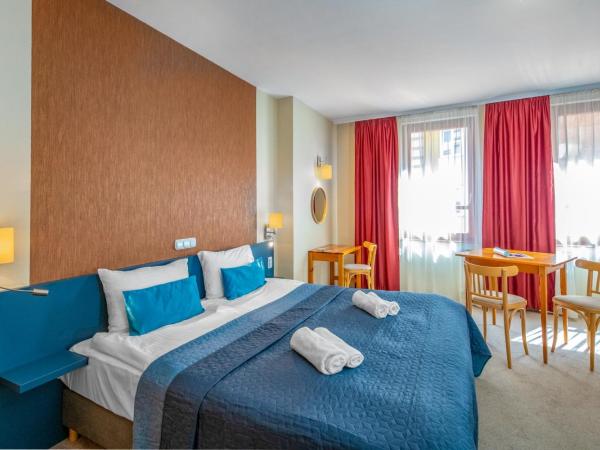 Corvin Hotel Budapest Residence : photo 3 de la chambre appartement avec douche