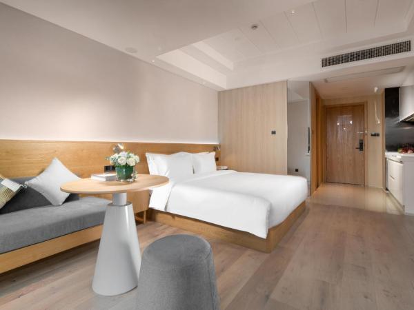 Westlake Art Hotel -Xiasha University Town Branch : photo 6 de la chambre chambre lit queen-size deluxe