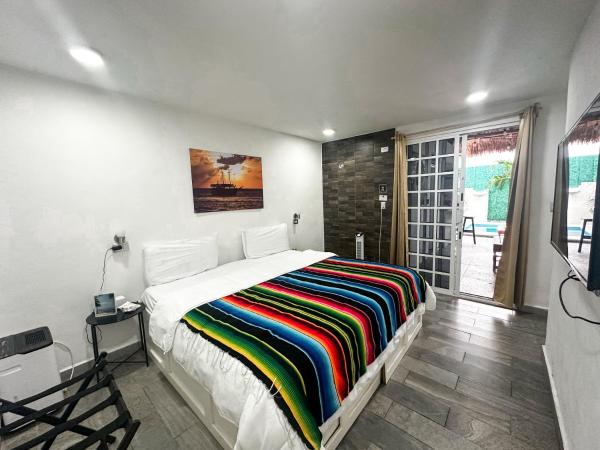 La Perle Noire - Auberge : photo 6 de la chambre chambre lit king-size standard