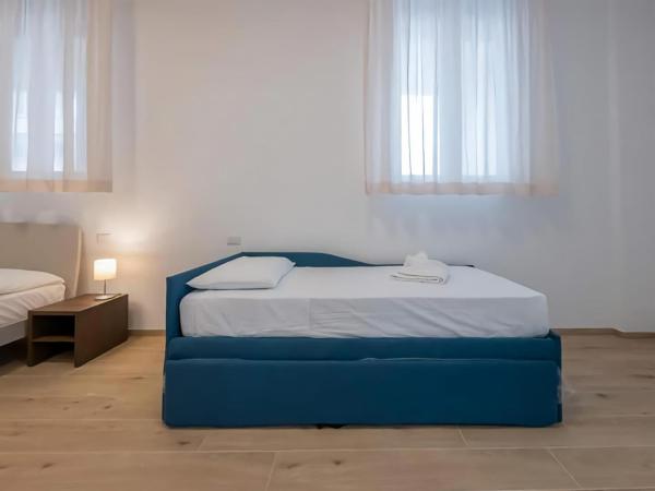 Casa Sforza IEO Suite : photo 3 de la chambre chambre quadruple