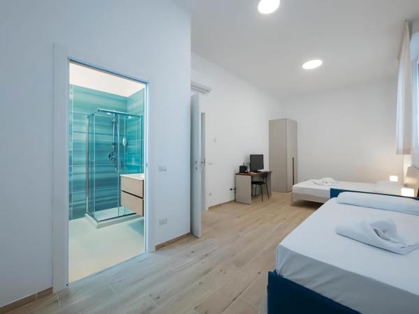 Casa Sforza IEO Suite : photo 4 de la chambre chambre quadruple