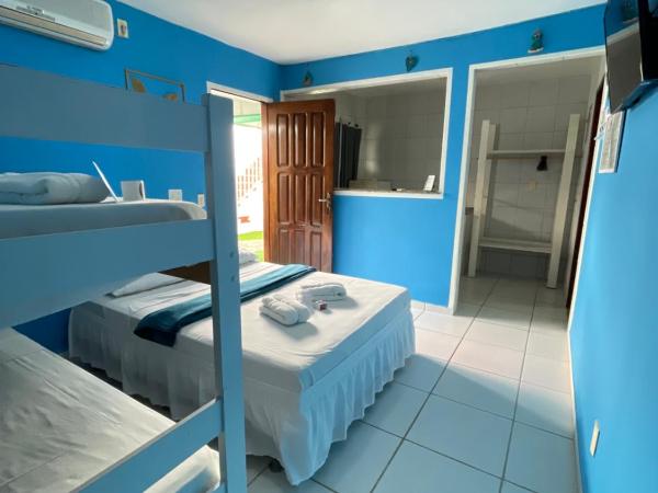 Pousada Jardim Magico : photo 1 de la chambre chambre familiale avec salle de bains privative