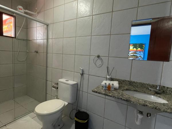 Pousada Jardim Magico : photo 5 de la chambre chambre lit king-size