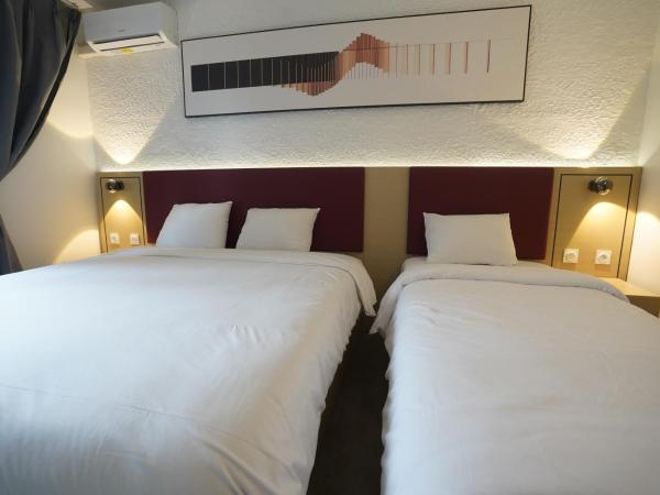 Anaïs Hôtel Bourges Nord Saint-Doulchard : photo 7 de la chambre chambre triple