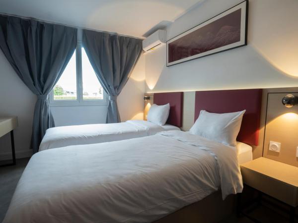 Anaïs Hôtel Bourges Nord Saint-Doulchard : photo 7 de la chambre chambre lits jumeaux pour personnes à mobilité réduite