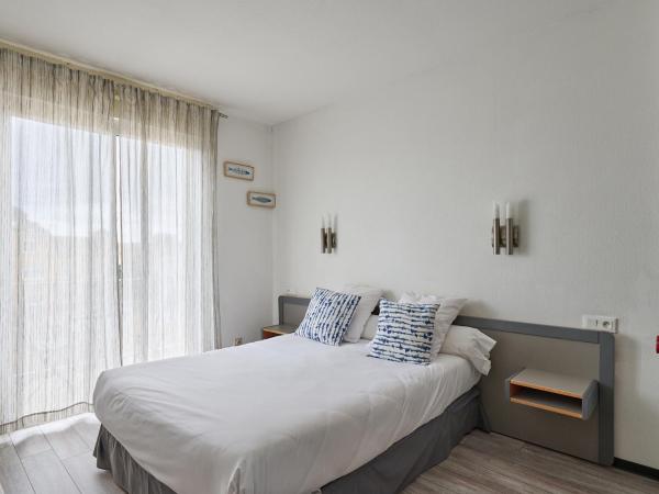 Hôtel Les Mimosas : photo 2 de la chambre chambre double confort avec balcon et climatisation - côté cour