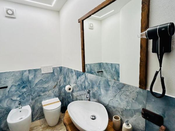 Villetta Capodimonte : photo 6 de la chambre chambre lit queen-size avec baignoire spa