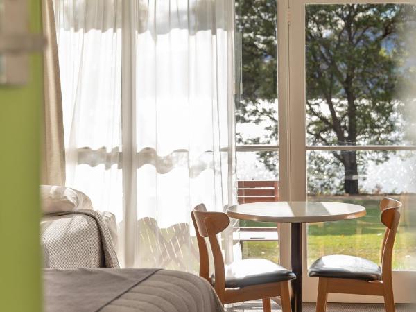 Riverfront Motel & Villas : photo 1 de la chambre chambre double ou lits jumeaux avec vue sur la rivière - rez-de-chaussée