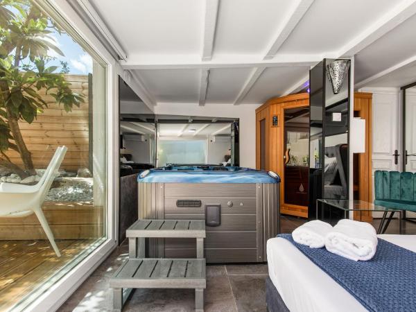 Villa Rasoa : photo 5 de la chambre chambre lit king-size - vue sur jardin