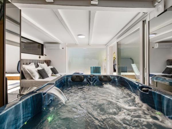 Villa Rasoa : photo 7 de la chambre chambre lit king-size - vue sur jardin