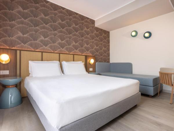 Hotel Diana : photo 3 de la chambre chambre triple deluxe avec balcon