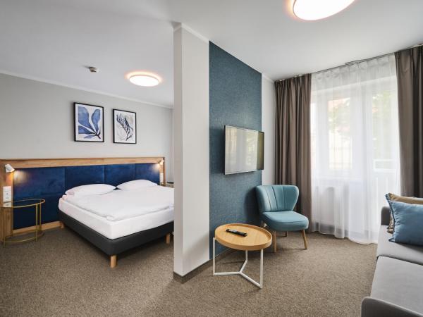 Halo Toruń : photo 2 de la chambre chambre double deluxe avec baignoire