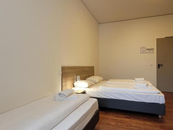 Queens Residenz : photo 4 de la chambre chambre triple