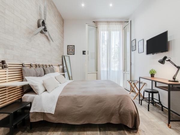 Panurban : photo 2 de la chambre chambre double ou lits jumeaux avec salle de bains privative externe