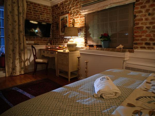 Paul's Fantasia Boutique Suites : photo 2 de la chambre suite - vue sur jardin