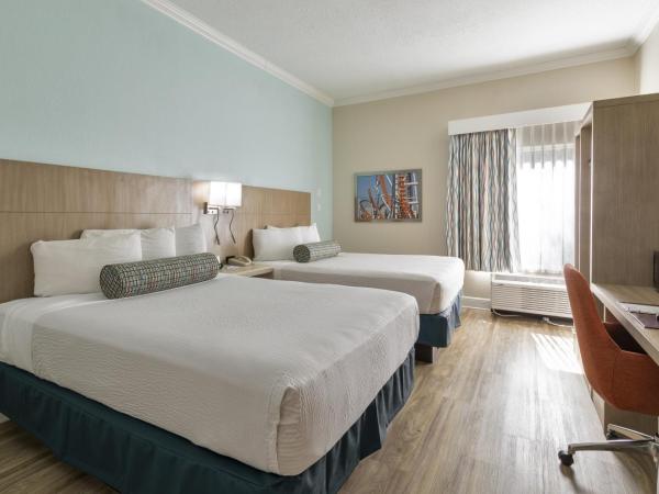 Galleria Palms Orlando - Free Theme Park Shuttles : photo 1 de la chambre chambre avec 2 grands lits queen-size