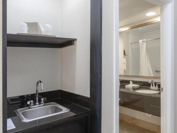 Galleria Palms Orlando - Free Theme Park Shuttles : photo 1 de la chambre chambre lit king-size avec canapé-lit