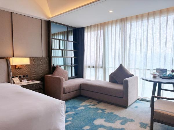 Beijing Xiamenair Jianianhua Hotel : photo 3 de la chambre chambre affaires lit queen-size